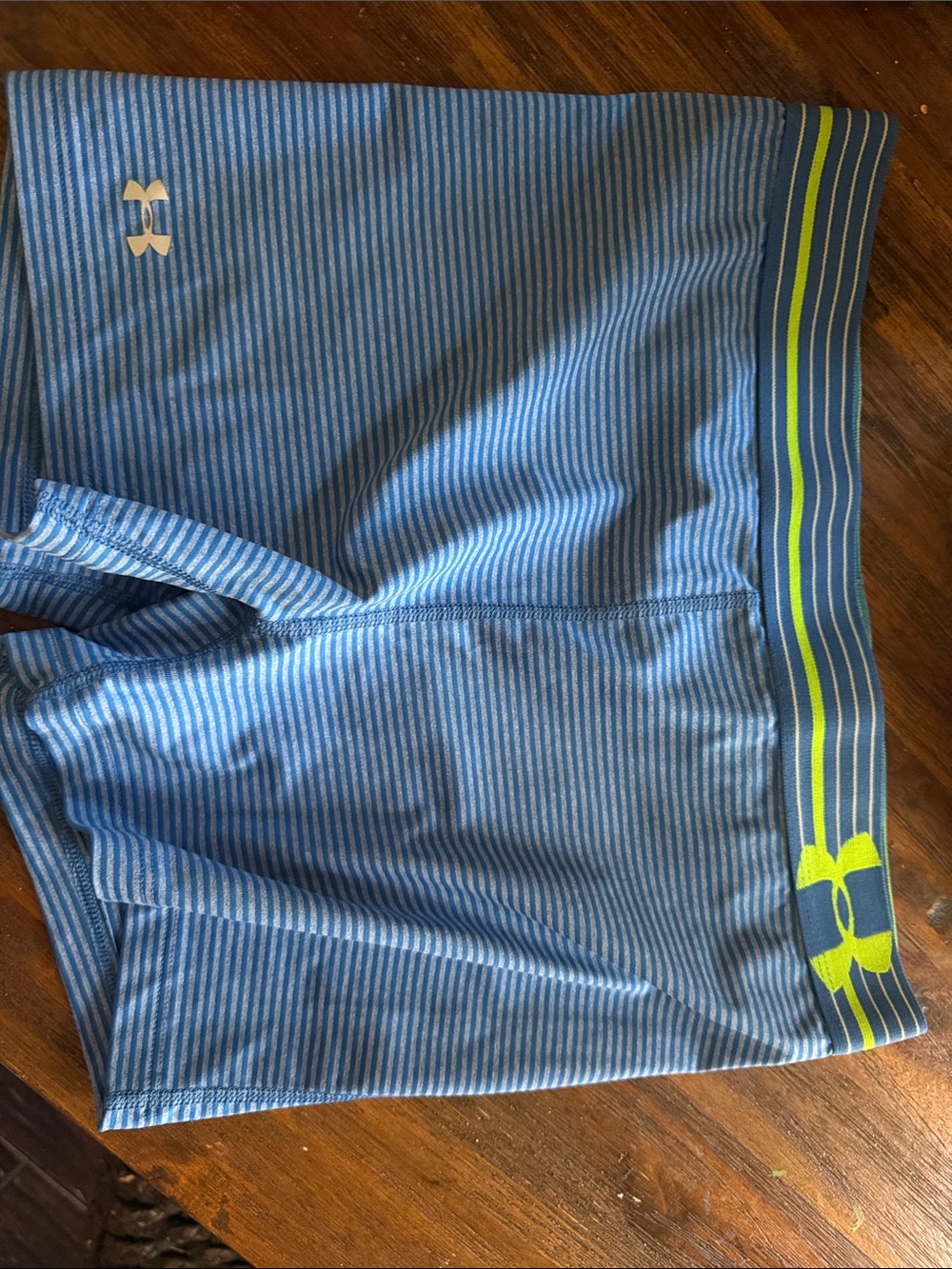 Under Armour Light Blue Striped Workout Shorts with Neon Yellow Accent